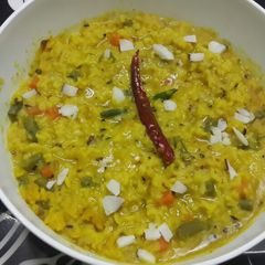 A picture of Moong Dal Khichdi (Yellow moong lentil khichdi).