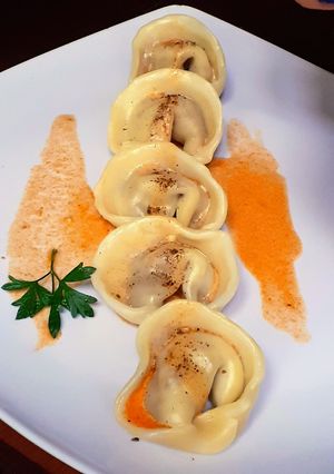 Una foto de Cappeletti de Chorizo y Cebolla