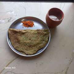 A picture of Green moong dal dosa.