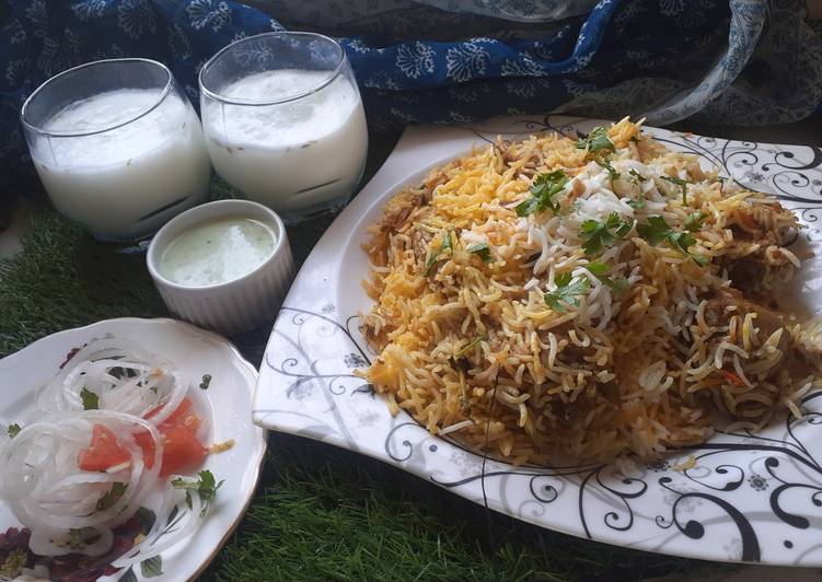 Chicken dam biryani with namkeen lassi