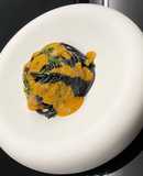 Squid Ink Spaghetti, Shellfish Butter, Sea Urchin Cream, and Gremolata