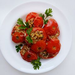 A picture of Mediterranean Style Stuffed Tomatoes.