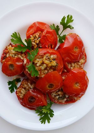 A picture of Mediterranean Style Stuffed Tomatoes.