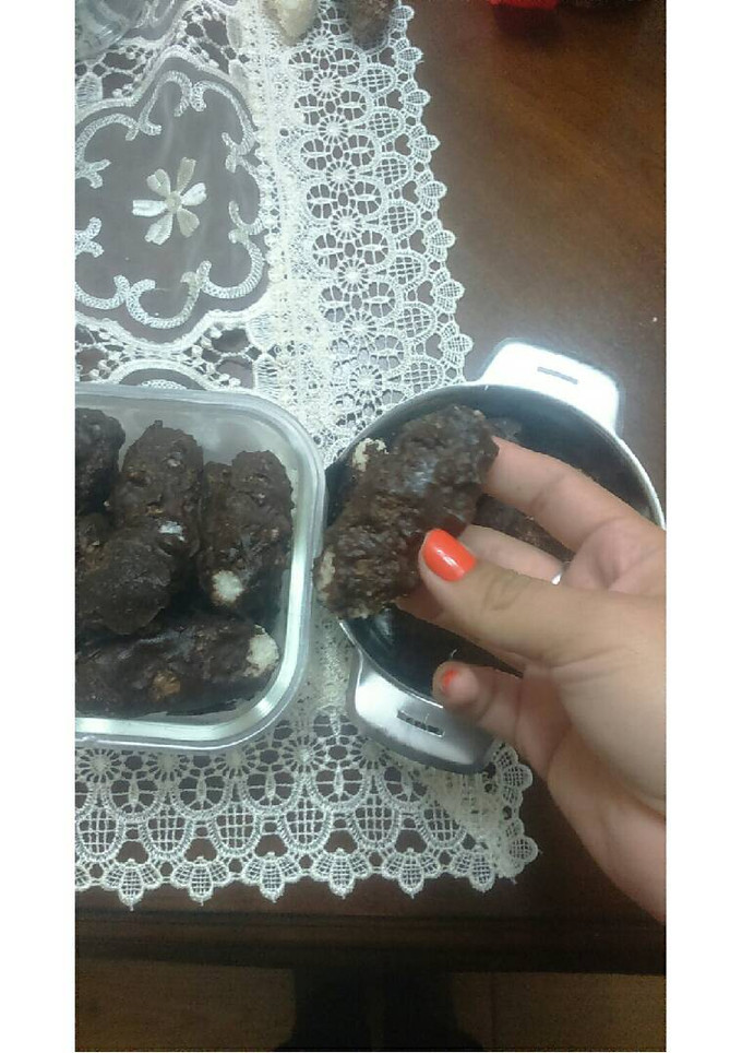 Una foto de Barras de coco bañadas en chocolate