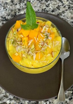 A picture of Golden milk fruit custard with jaggery.