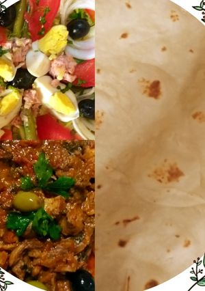 Une photo de Pain pita maison avec salade et chawarma de poulet