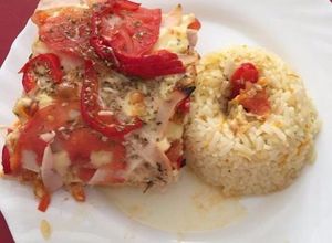 Una foto de Reineta al horno con arroz