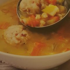 A picture of Slow Cooker vegetable broth with mini bacon dumplings.