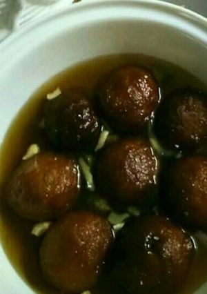 A picture of Bread gulabjamun in leftover sugar syrup....
