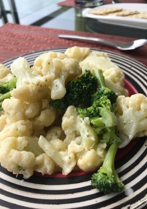 Una foto de Coliflor brócoli y queso