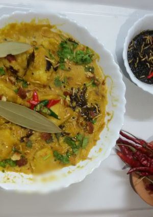 A picture of Dahi moong daal with pitha curry.(moong dal with yogurt recipe).