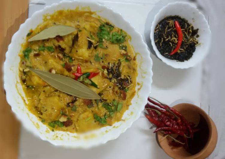 Step-by-Step Guide to Prepare Super Quick Homemade Dahi moong daal with pitha curry.(moong dal with yogurt recipe)