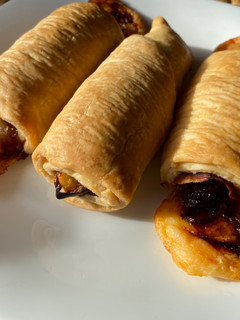Una foto de Rollitos de queso y jamón