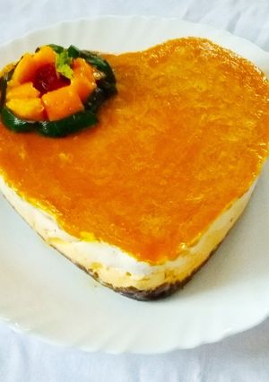 A picture of Oreo Mango Icecream Sandwich with Mango glaze.