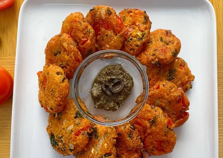 TOMATOKEFTEDES (Greek tomato fritters) served with  olive paste (Tapenade)