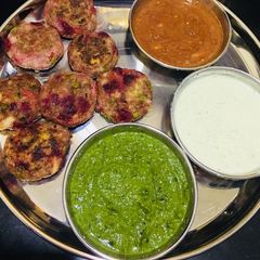 Vegetables kabab with green chutney, mint curd and garlic chutney A picture of Vegetables kabab with green chutney, mint curd and garlic chutney.