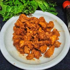 A picture of Chicken Tikka chunks.