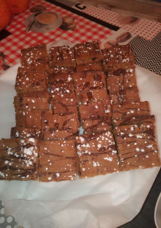 Una foto de Cuadraditos de avena sabor naranja con pasas y chocolate