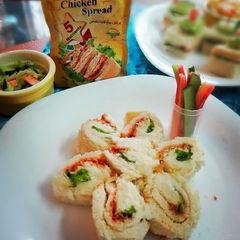 A picture of Pin-Wheel Sandwhich with Steamed Vegies.