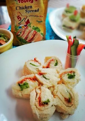 A picture of Pin-Wheel Sandwhich with Steamed Vegies.