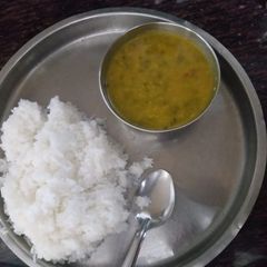 Green dal with boiled rice A picture of Green dal with boiled rice.