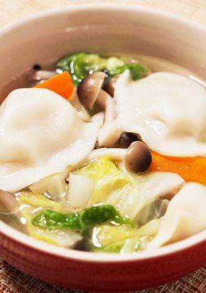 A picture of Hearty Vegetable Soup with Napa Cabbage and Dumplings.