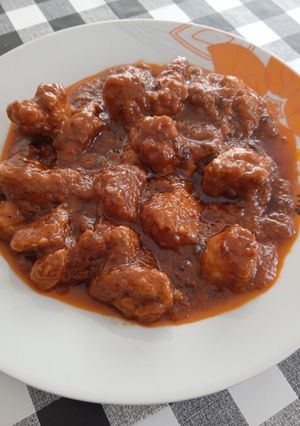 Una foto de Carne con tomate