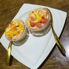 A picture of Fruity salad🍉🍊🍍🍌.