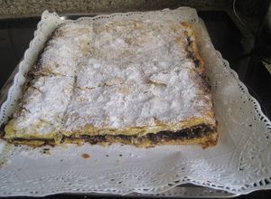 Una foto de Coca de San Juan de chocolate crujiente al Cointreau