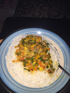 A picture of Curry sauce with boiled rice.