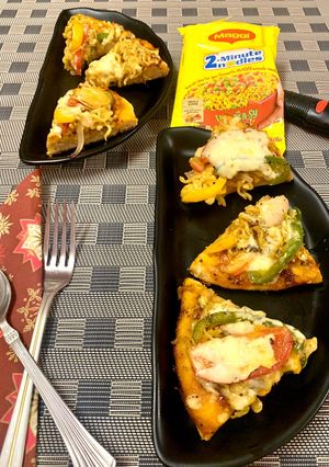 ম্যাগি পিজ্জা(Maggi pizza recipe in Bengali) রেসিপির প্রধান ছবি