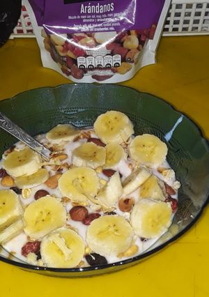 A picture of Yogurt with Banana, Almonds, and Mixed Nuts.