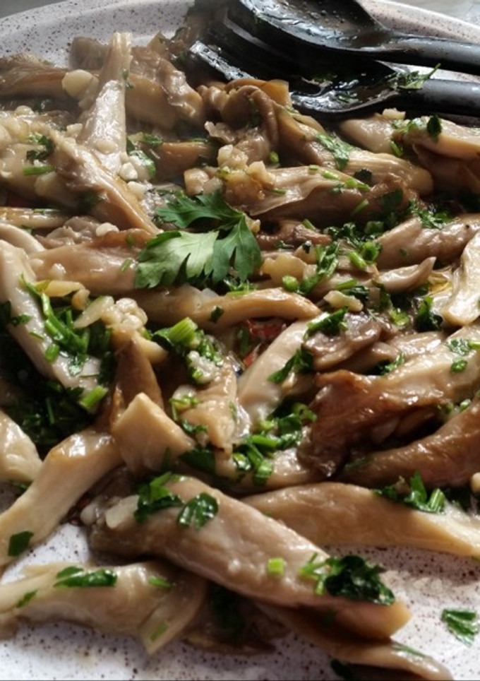Una foto de Setas al Ajillo (Menú Vegano)