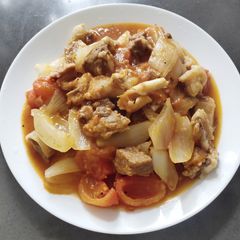 A picture of Beef Brisket in Tomato and Onion.