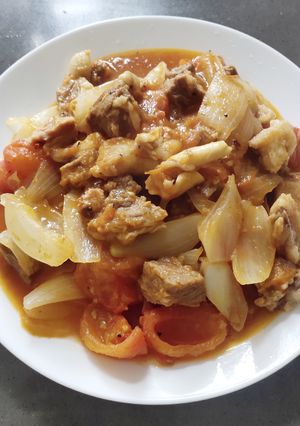A picture of Beef Brisket in Tomato and Onion.