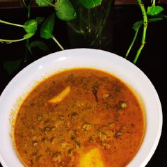 A picture of Green Chana With Aloo.