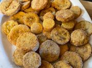 A picture of fried fish and veggies