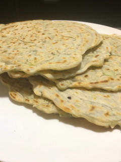 Una foto de Panqueques chinos con cebollín
