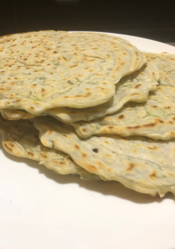 Una foto de Panqueques chinos con cebollín