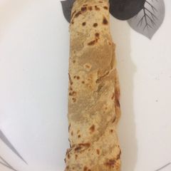 A picture of Rolling Paneer stuffed roti.