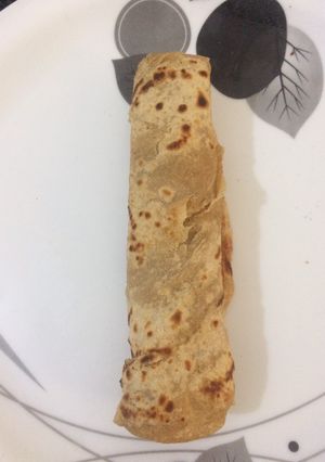 A picture of Rolling Paneer stuffed roti.