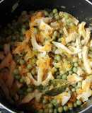 Guatitas a la jardinera con arroz al ajo