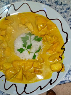 Una foto de Pollo al curry