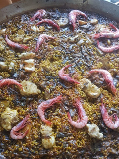 Una foto de Arroz de rape y alcachofas