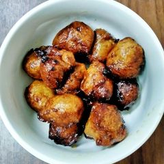A picture of Banana Fritters in Jaggery Syrup.