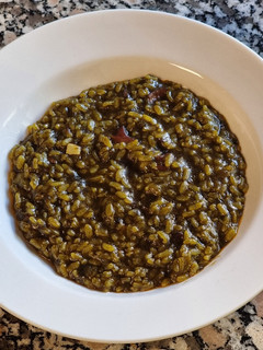 Una foto de Arroz con calamares en su tinta TM31