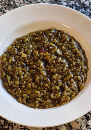Una foto de Arroz con calamares en su tinta TM31