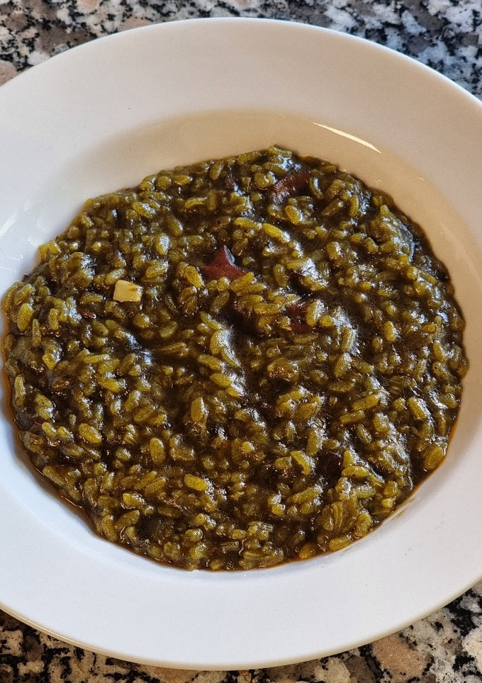 Una foto de Arroz con calamares en su tinta TM31