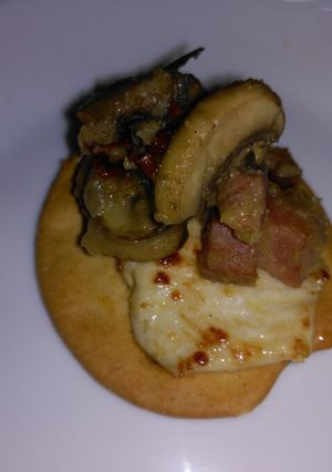 Una foto de Pechuga de pollo con champiñones