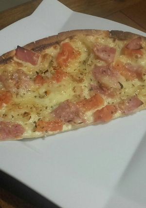 Une photo de Flammekueche tomates jambon raclette